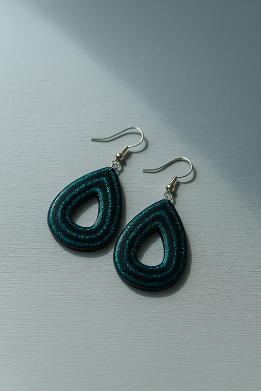 Glittriga rundaovala